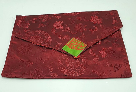 Etui na książeczki - brązowe w smoki