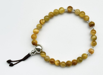 Mala 27 - tiger eye yellow 6,5 mm
