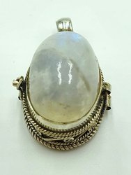 Silver ghau with rainbow moonstone.