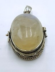 Silver ghau with rainbow moonstone.